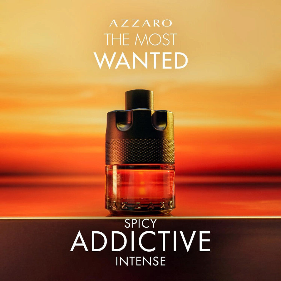 Azzaro The Most Wanted Spicy Addictive Intense perfume bottle on a gradient background